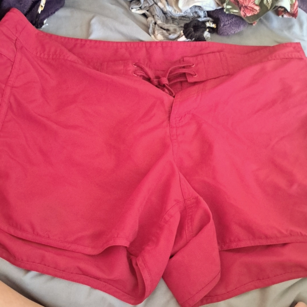Red swim shorts